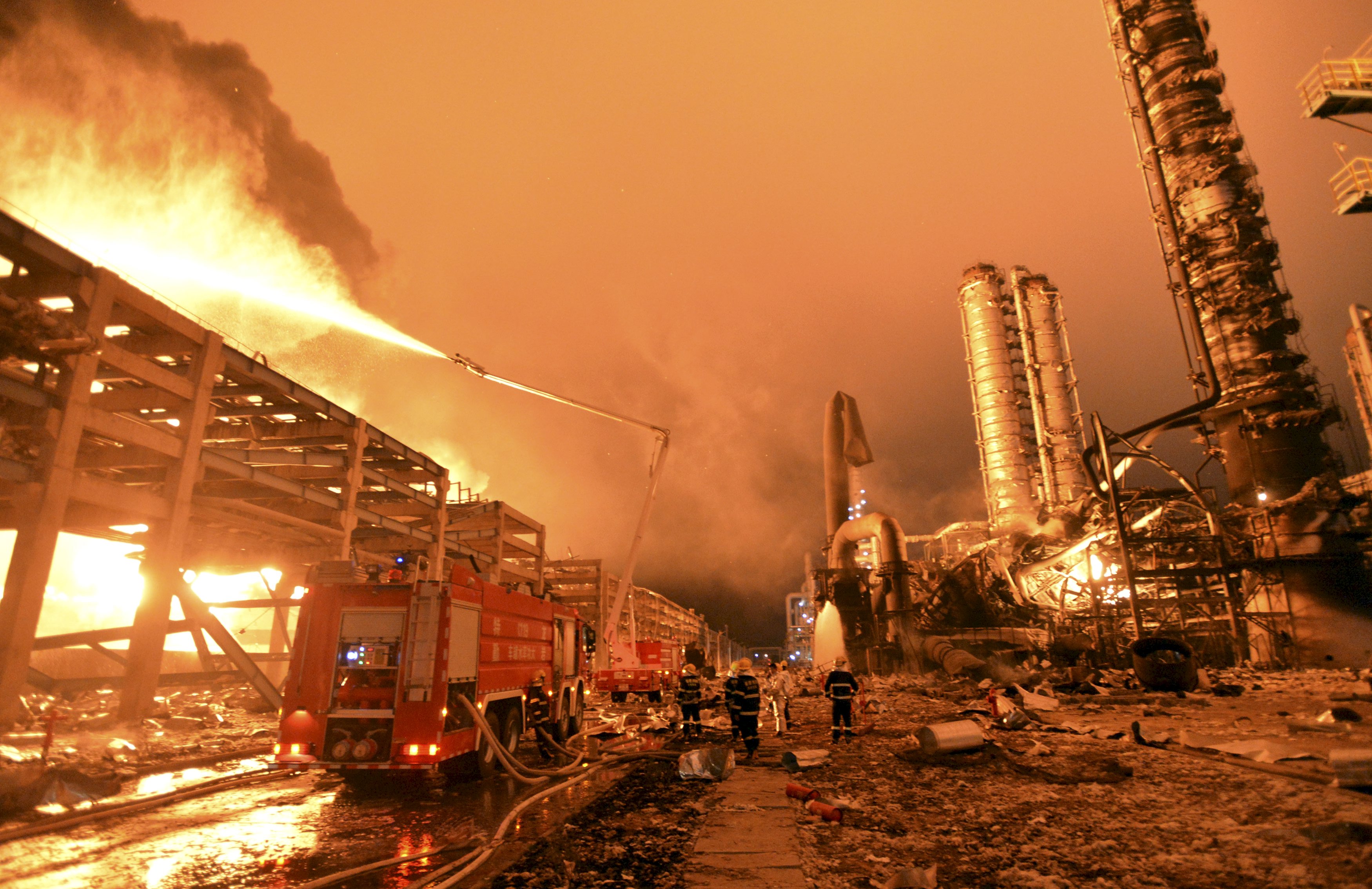 Firefighters try to extinguish a fire at a petrochemical plant in Zhangzhou