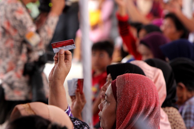 Pembagian Kartu Jaminan Kesehatan Nasional Kepada Warga Kampung Melayu, Jakarta Timur Oleh Presiden Joko Widodo, 13 Mei 2015