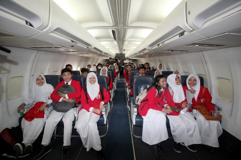 Naik Pesawat
