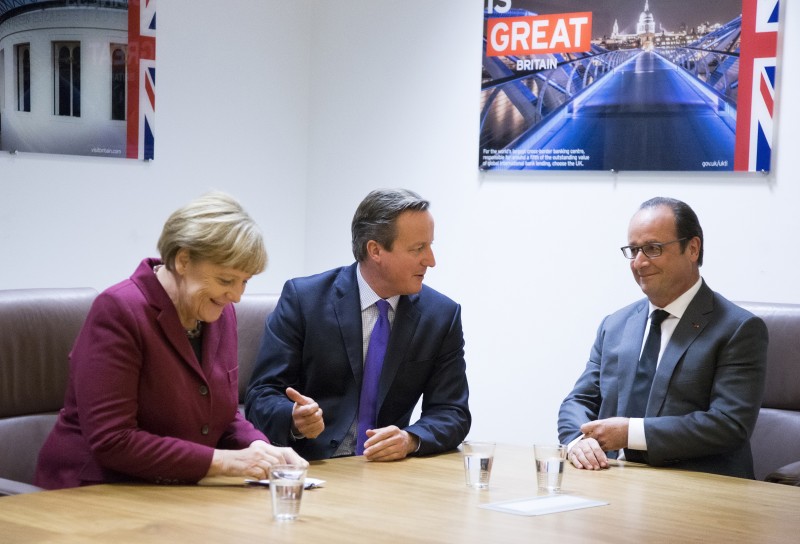 German Chancellor Merkel, British Prime Minister Cameron and French President Hollande take part in a meeting at the European Union leaders summit in Brussels