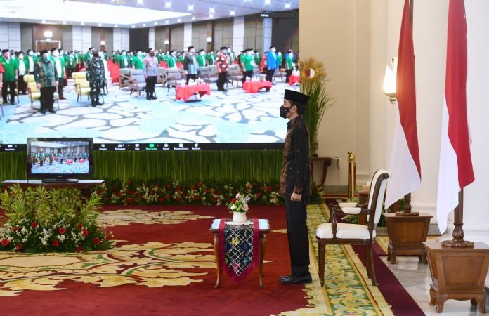 Presiden Joko Widodo memberikan sambutan melalui telekonferensi dalam acara peresmian pembukaan Konferensi Besar XXIII Gerakan Pemuda (GP) Ansor Tahun 2020