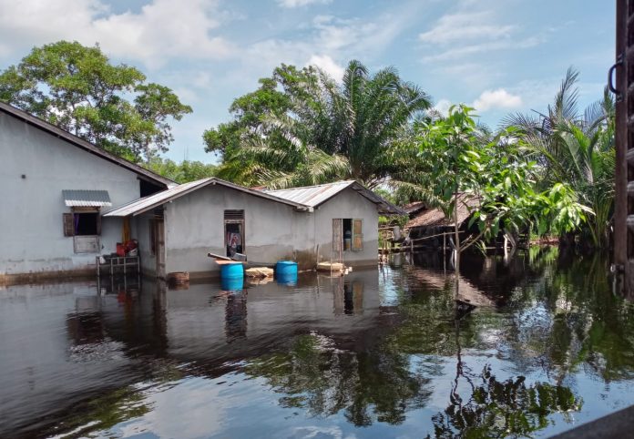 Banjir yang menggenangi rumah warga di Desa Sejegi, Kecamatan Mempawah Timur, Rabu, 21 Juli 2021