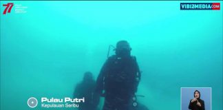 pengibaran bendera Merah Putih di bawah laut