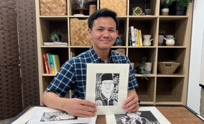 Maulana Abdul Azis, diaspora asal Purwakarta pendiri Cutterme, seni potong kertas menyerupai potret stensil di Maryland, AS (dok VOA)