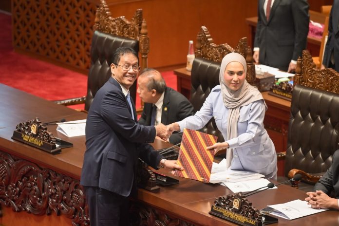 Menkeu Purbaya dalam Rapat Paripurna DPR RI ke-25 mengenai Pertanggungjawaban Pelaksanaan APBN Tahun Anggaran 2025 di Gedung DPR RI, Selasa (14 Juli 2026). (Foto Dok. Kemenkeu)